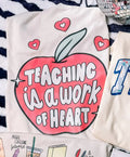 *PRE-ORDER* TEACHING IS A WRK OF HEART GRAPHIC TEE